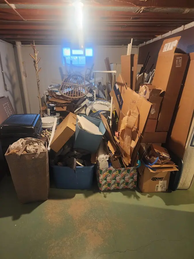 Roll-off dumpster container at job site for 15 Yard Dumpster Rental in Pine City